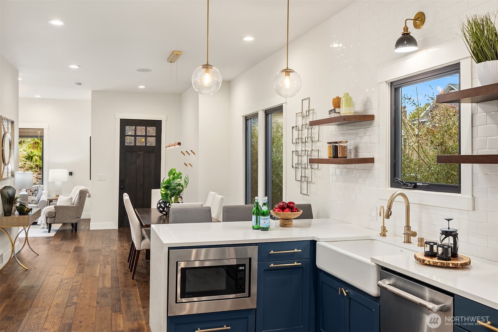 A Microwave drawer is such an efficient use of space!  Note the bronze accents throughout ... light fixtures, cabinet pulls and faucet hardware! Absolutely gorgeous!