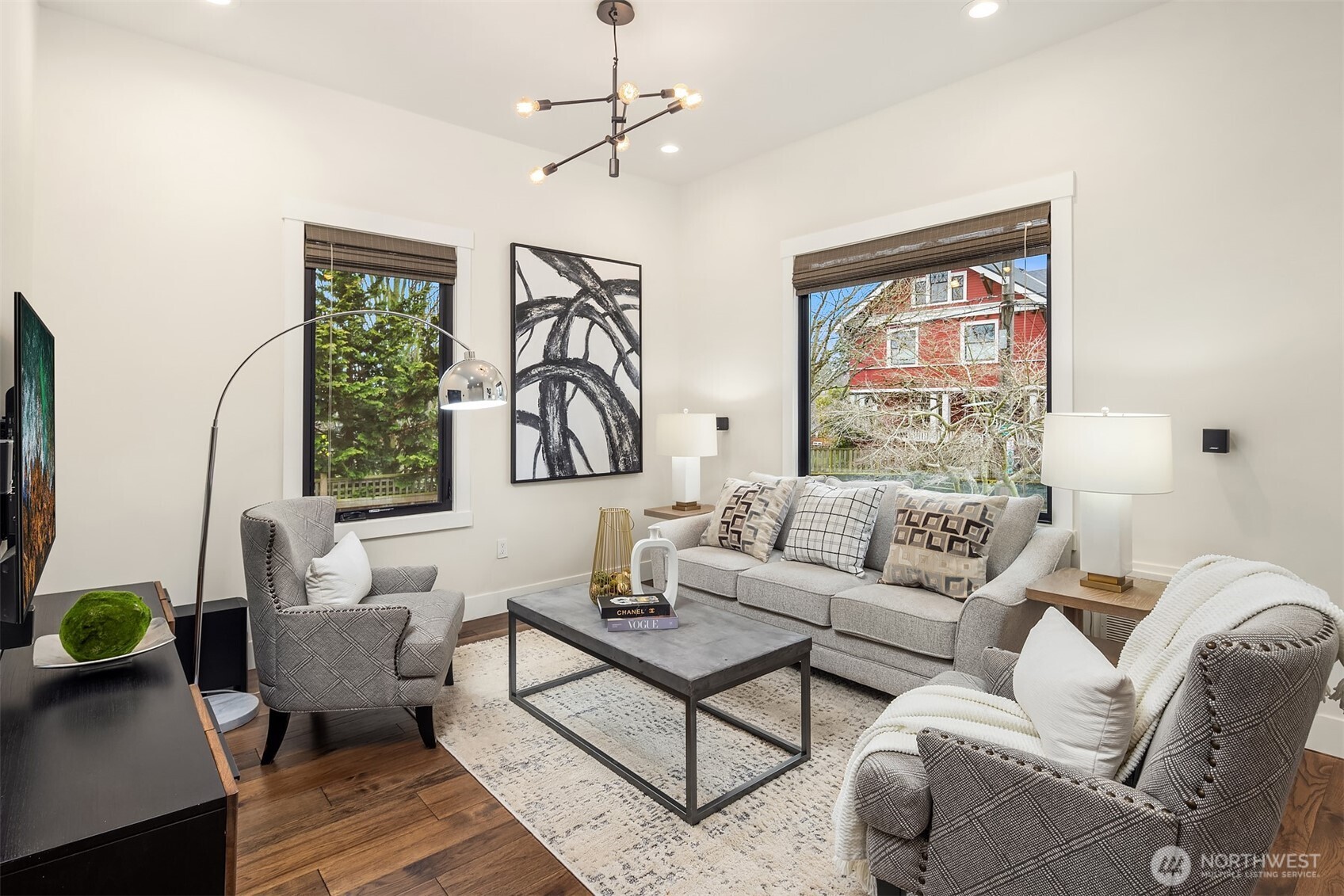 Open the door and the splendor begins. Take in the elevated ceilings, modern Sputnik light fixture and tasteful Hunter Douglas window treatments.