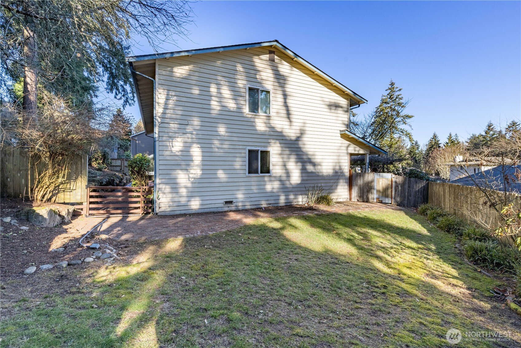 Full southern view of home and yard.