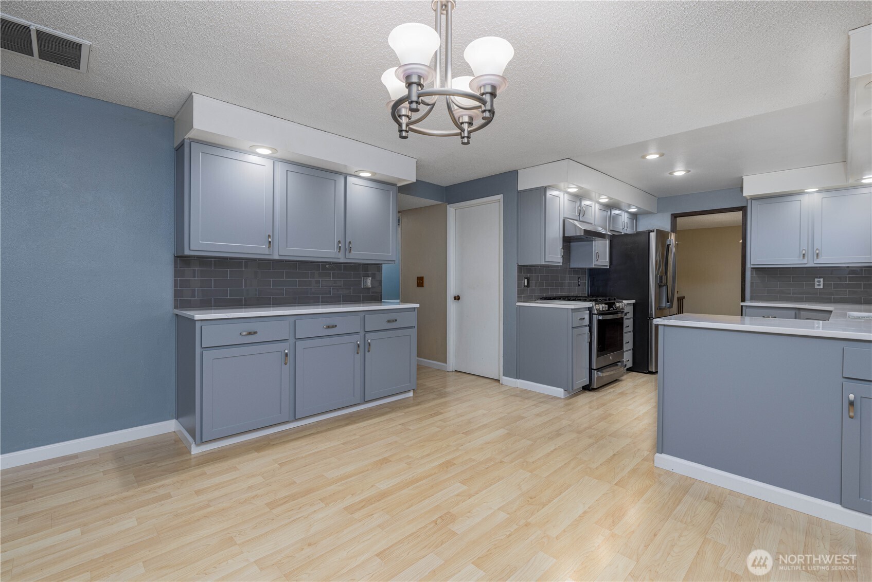 View of the eat-in kitchen from the dining space.