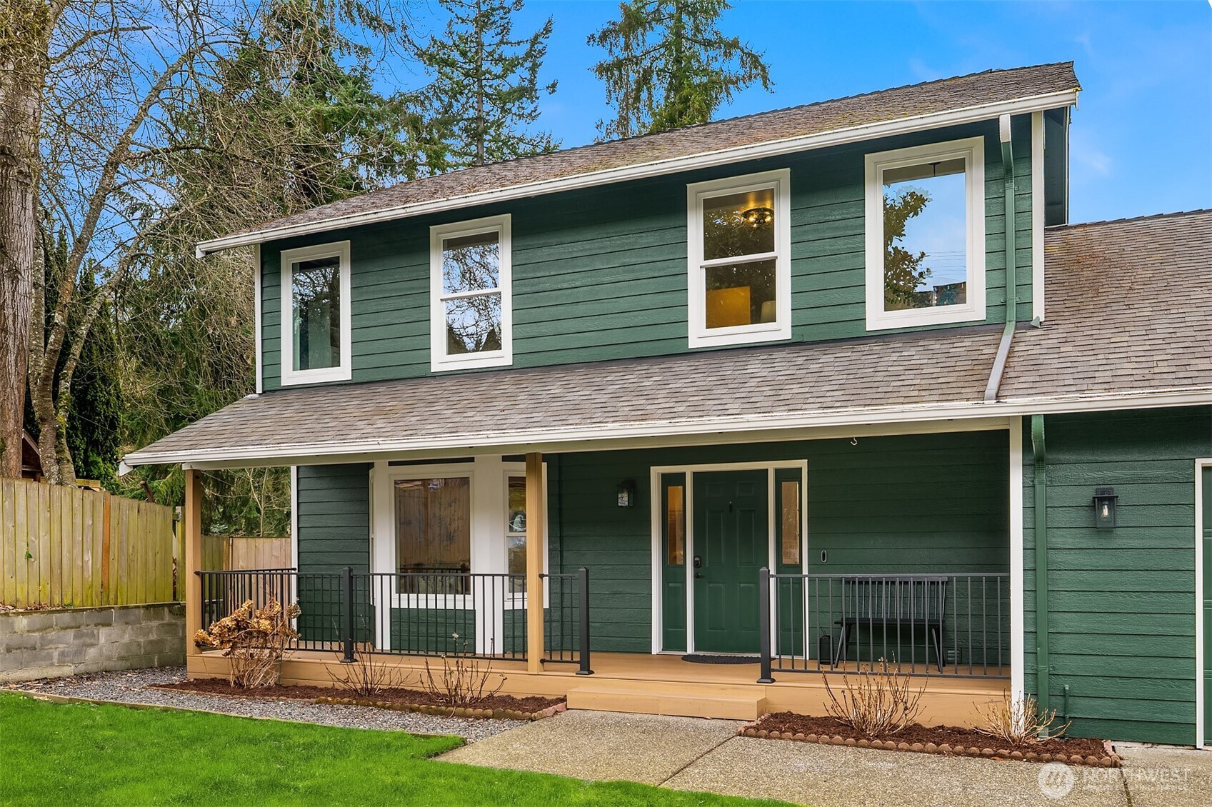 Upgraded Trex deck and railings make a welcoming, weather-resistant entrance.