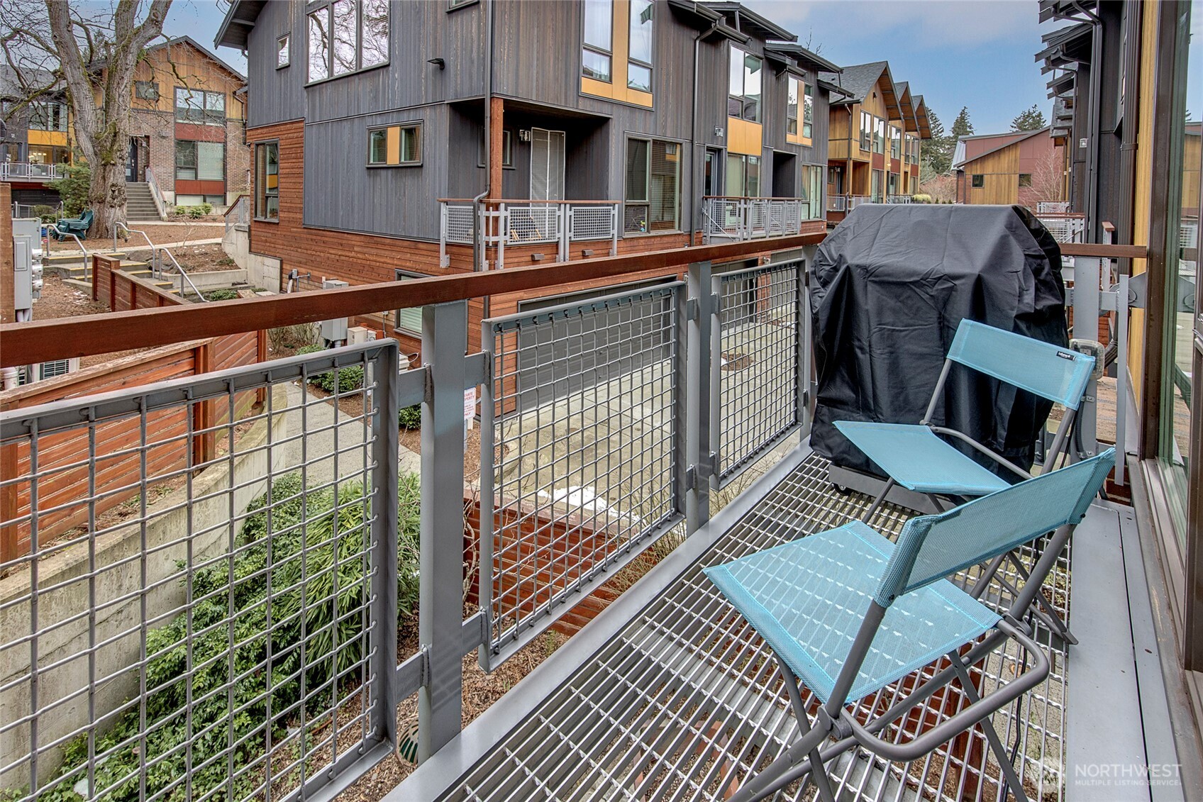 Deck looks down to private garden & patio!