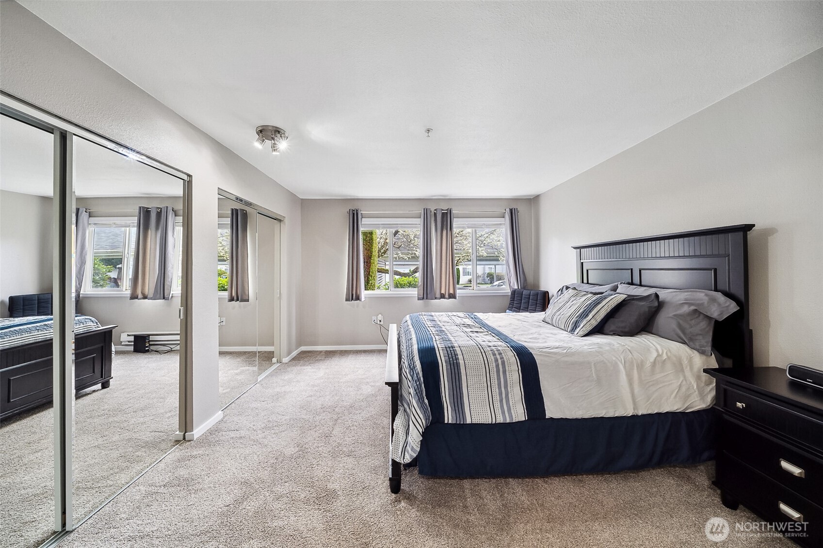 Oversized master bedroom easily holds king size bed