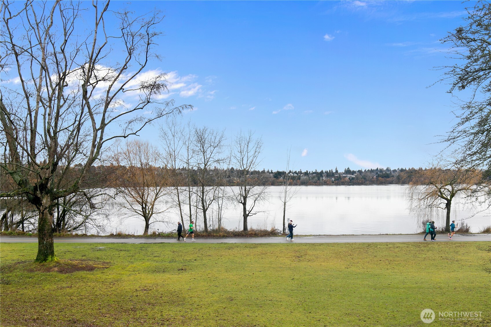 Soak in neighborhood views, with Green Lake as the centerpiece of this highly sought-after area.