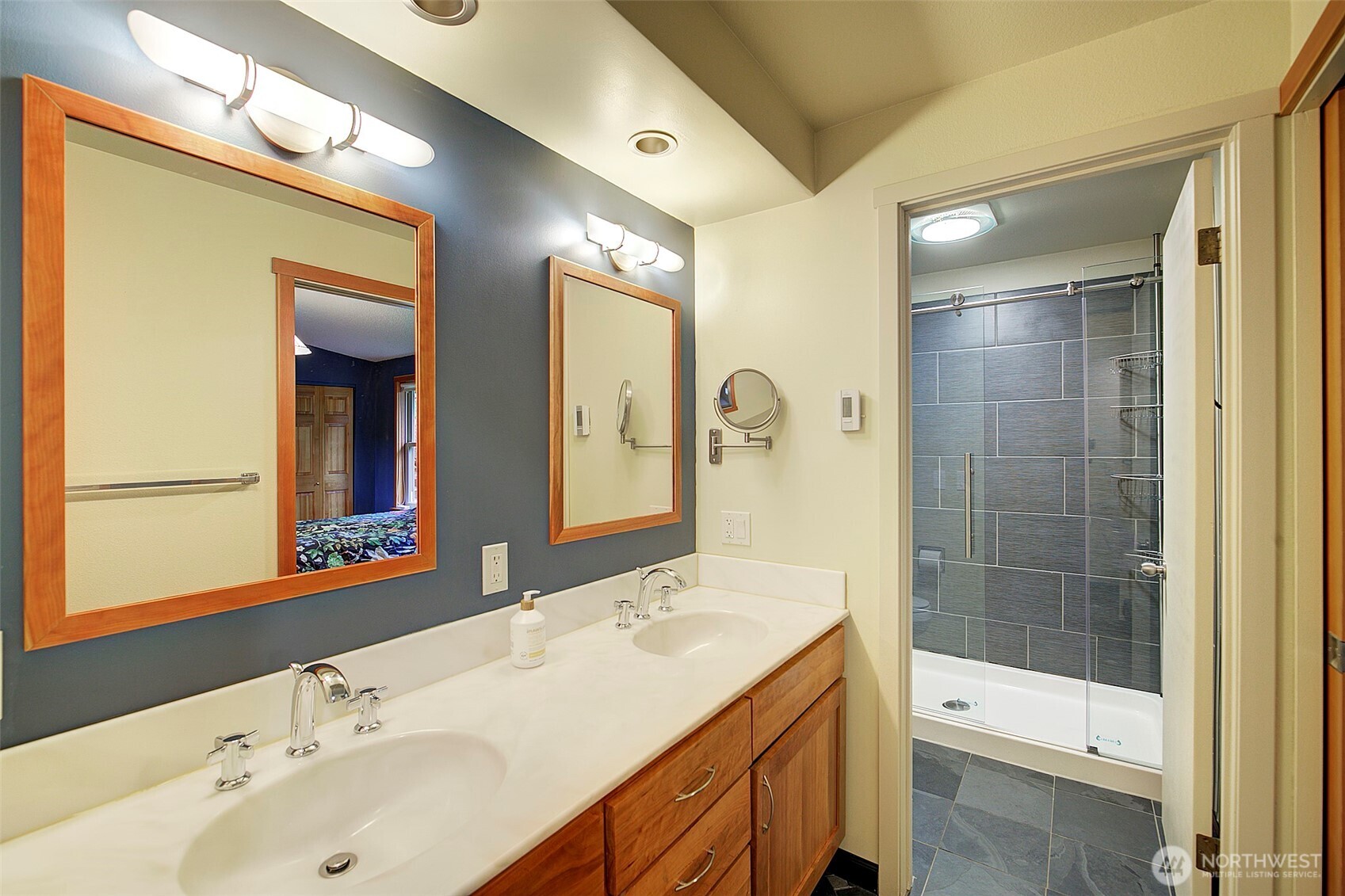 Modern primary bathroom with double vanity