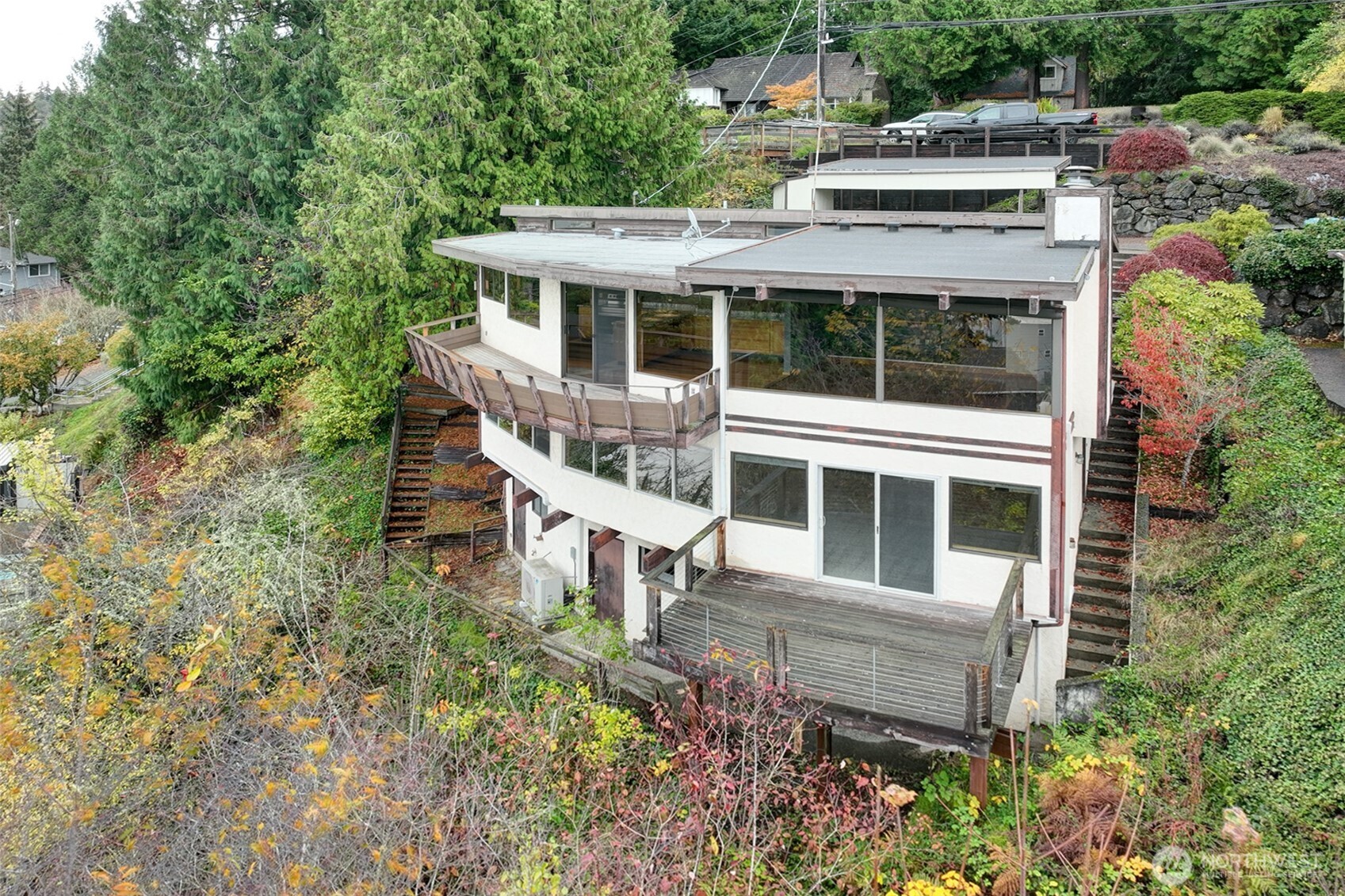 Large picture windows frame the gorgeous westerly views