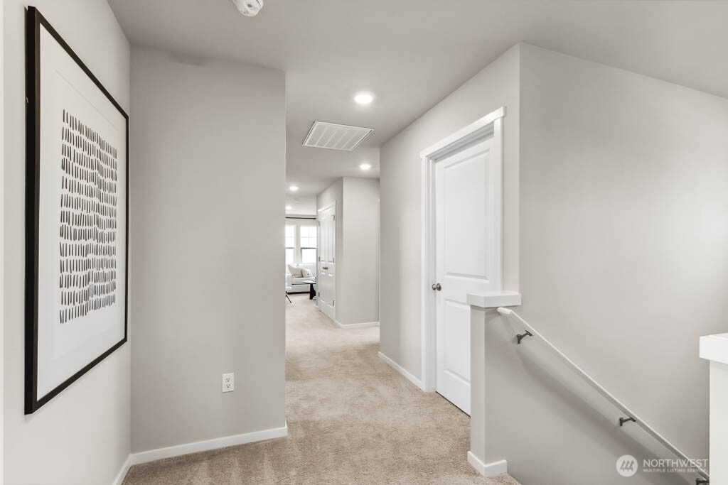 2nd floor hallway. Photo is representational. Actual home is under construction. Colors, details and finishes will vary. See site agent for details.