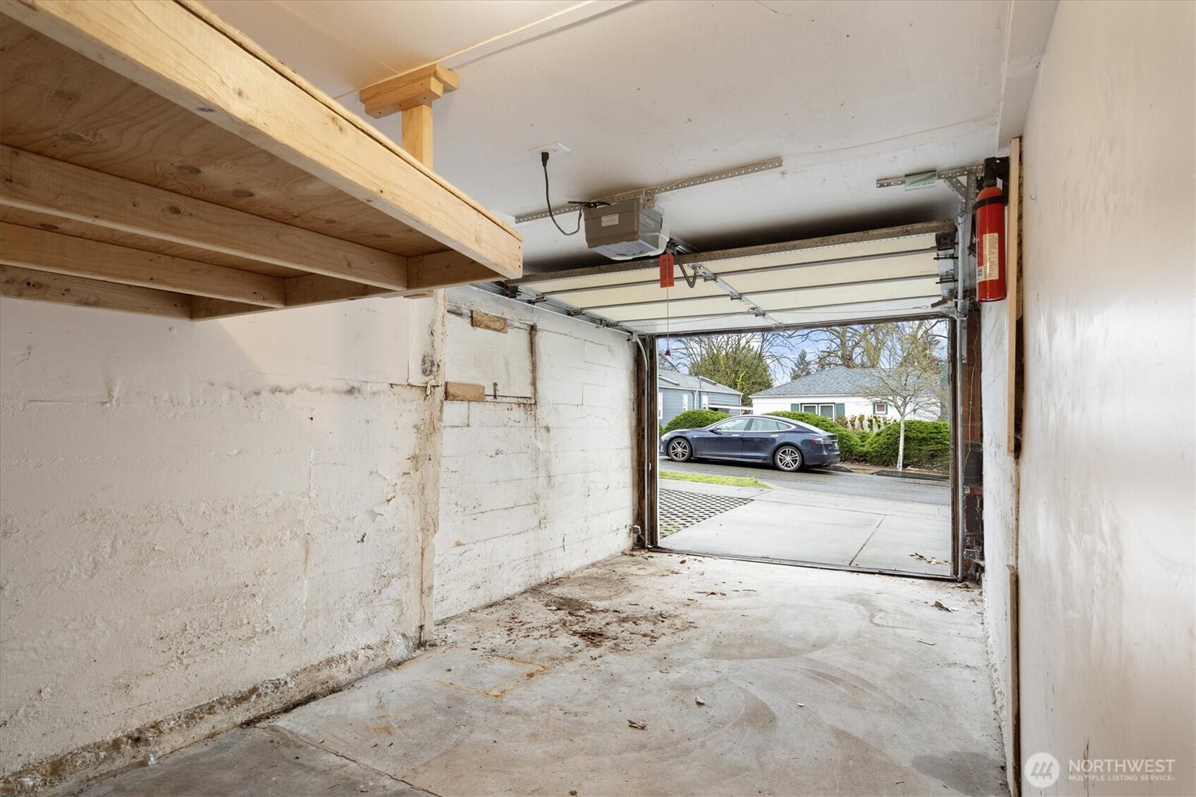 Attached one-car garage with storage