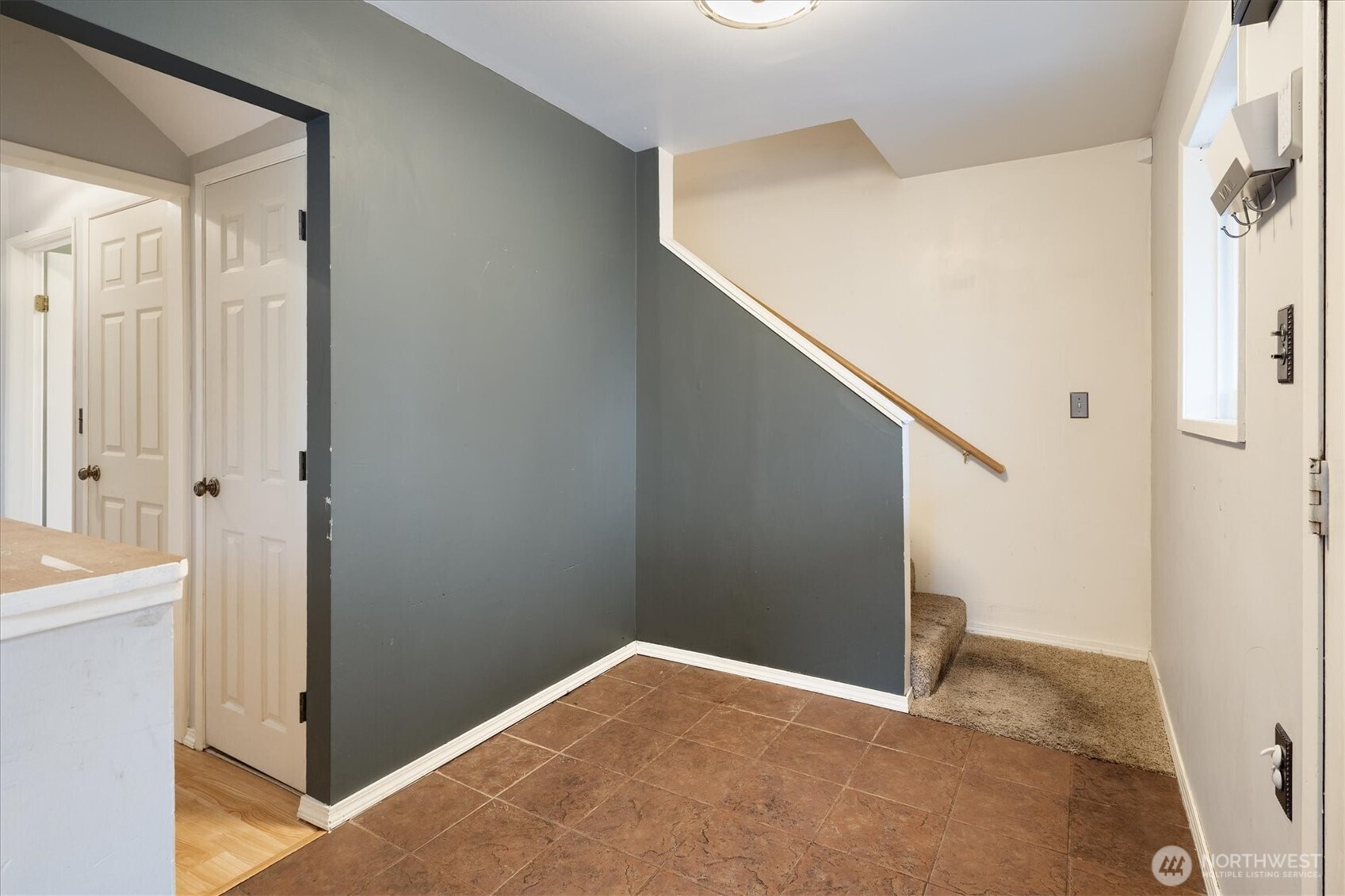 Front Entry on main level and stairs to the second floor.