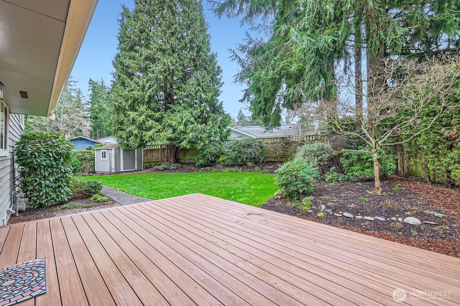 Beautiful new deck in backyard off dining/kitchen.