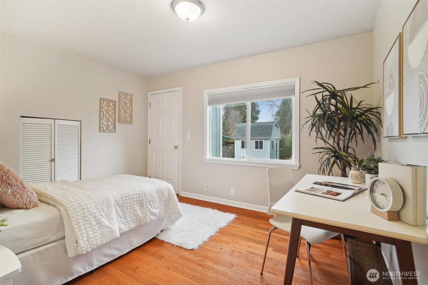 Head up just four steps to find two additional bedrooms, both bright and cheery!