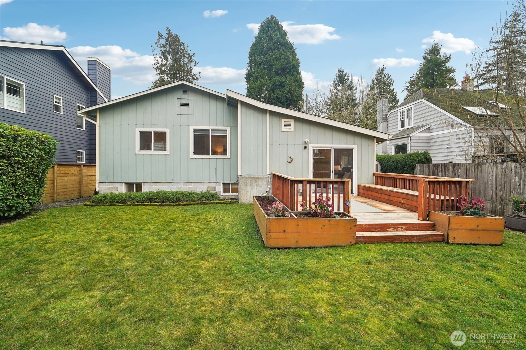 Head out to the large, flat and fully fenced backyard to discover even more space!