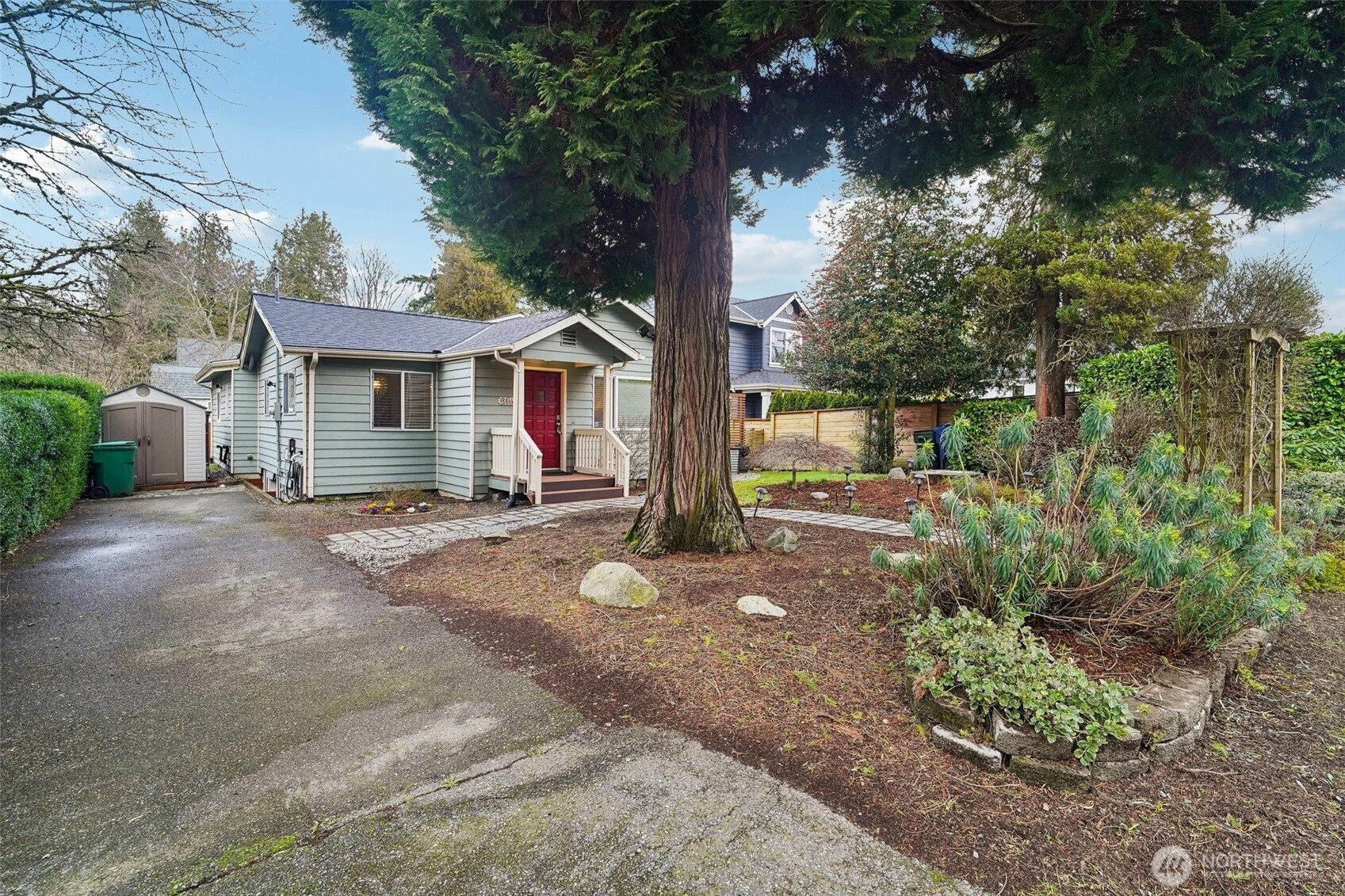 The long driveway offers plenty of off-street parking space.