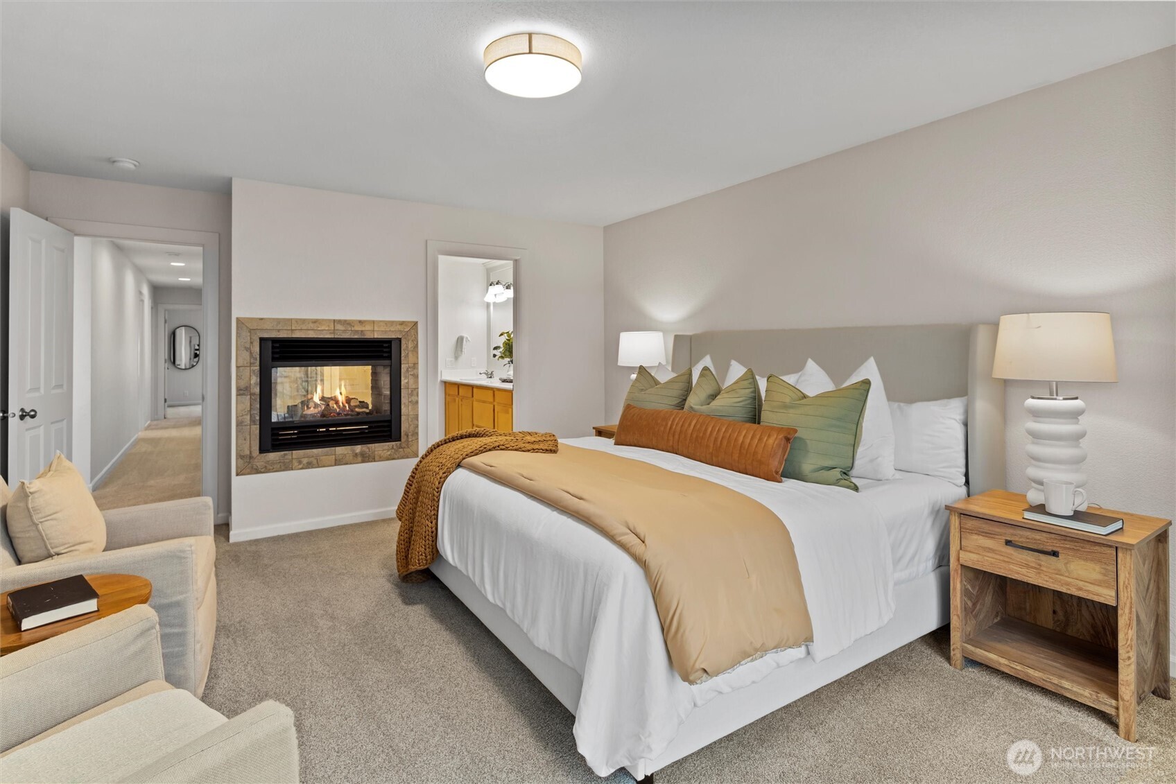 Primary bedroom with double sided fireplace.