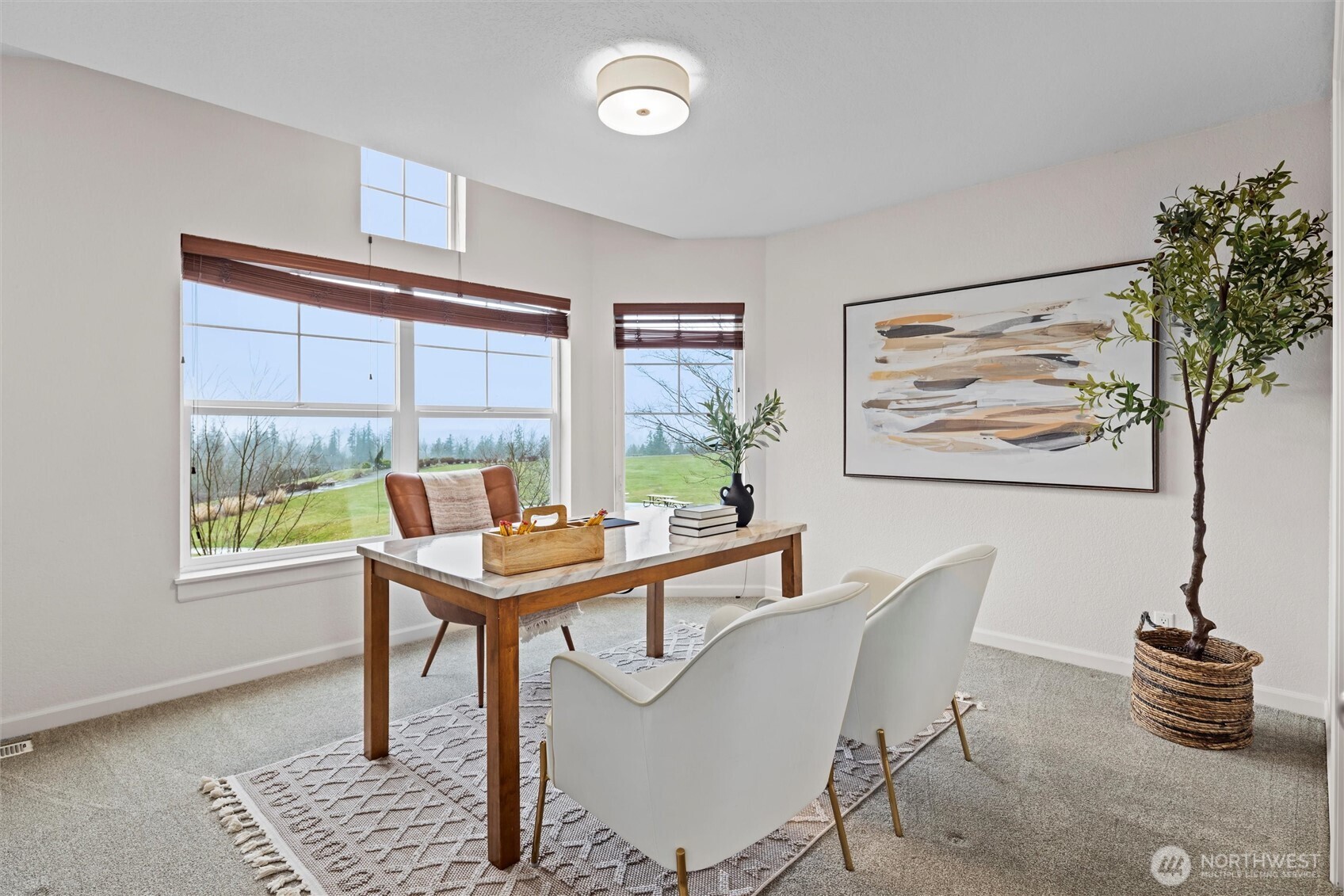 Front bedroom with views staged as an office.