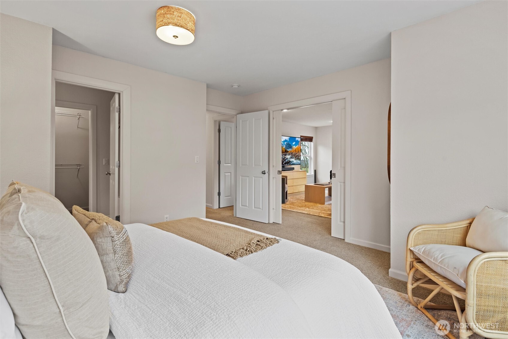 Bedroom with pocket doors to the bonus room. Great for MIL. Teen space and guest quarters.