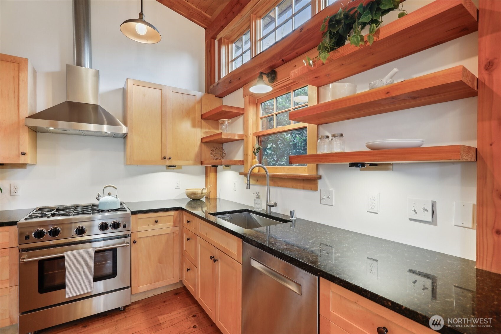 Kitchen features quality stainless steel appliances.