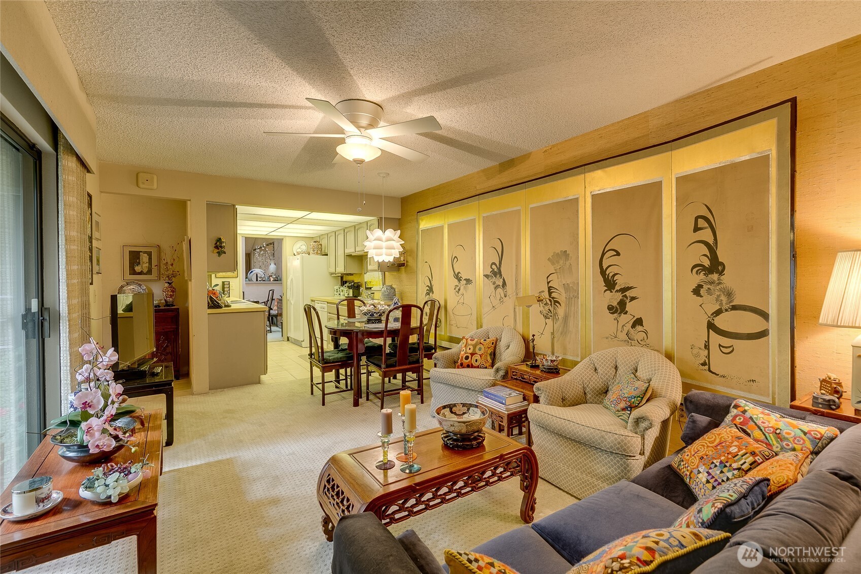 Another view of family room from door to garage. Utility room to the left.