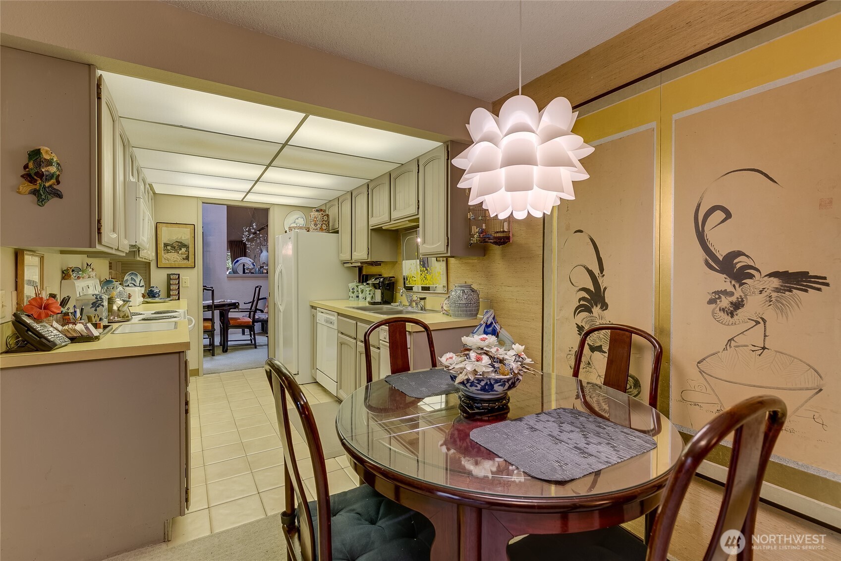 View of family room table looking towards kitchen