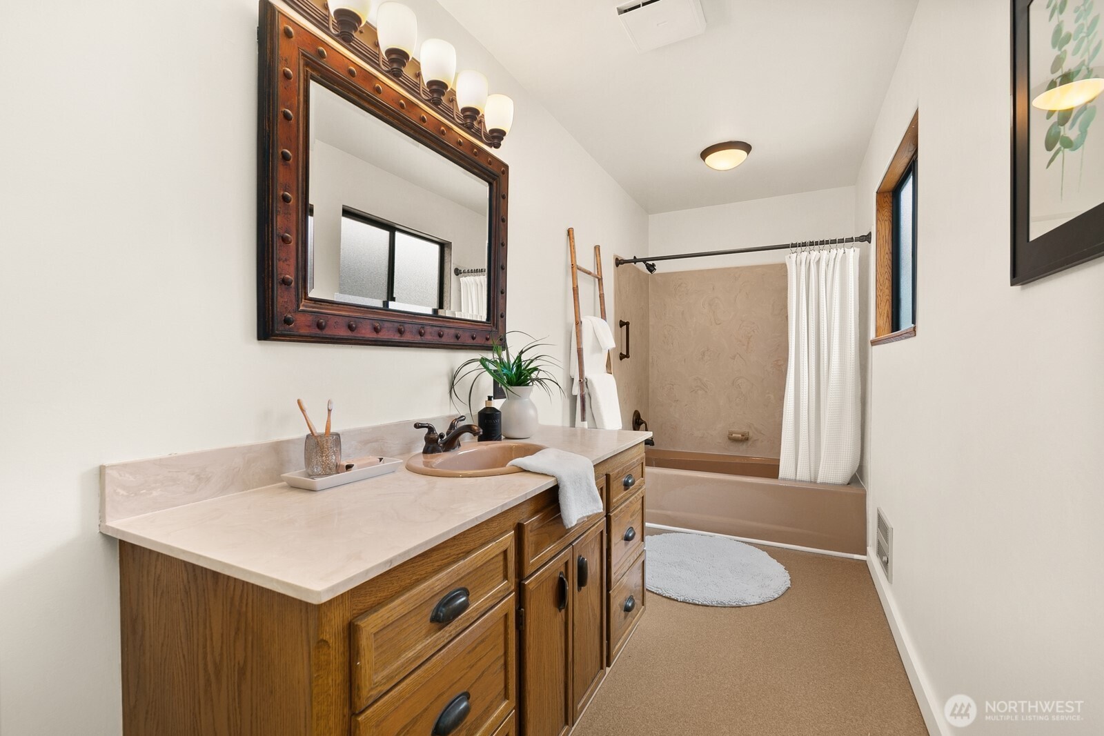 Main floor bedroom is peaceful with built in closet