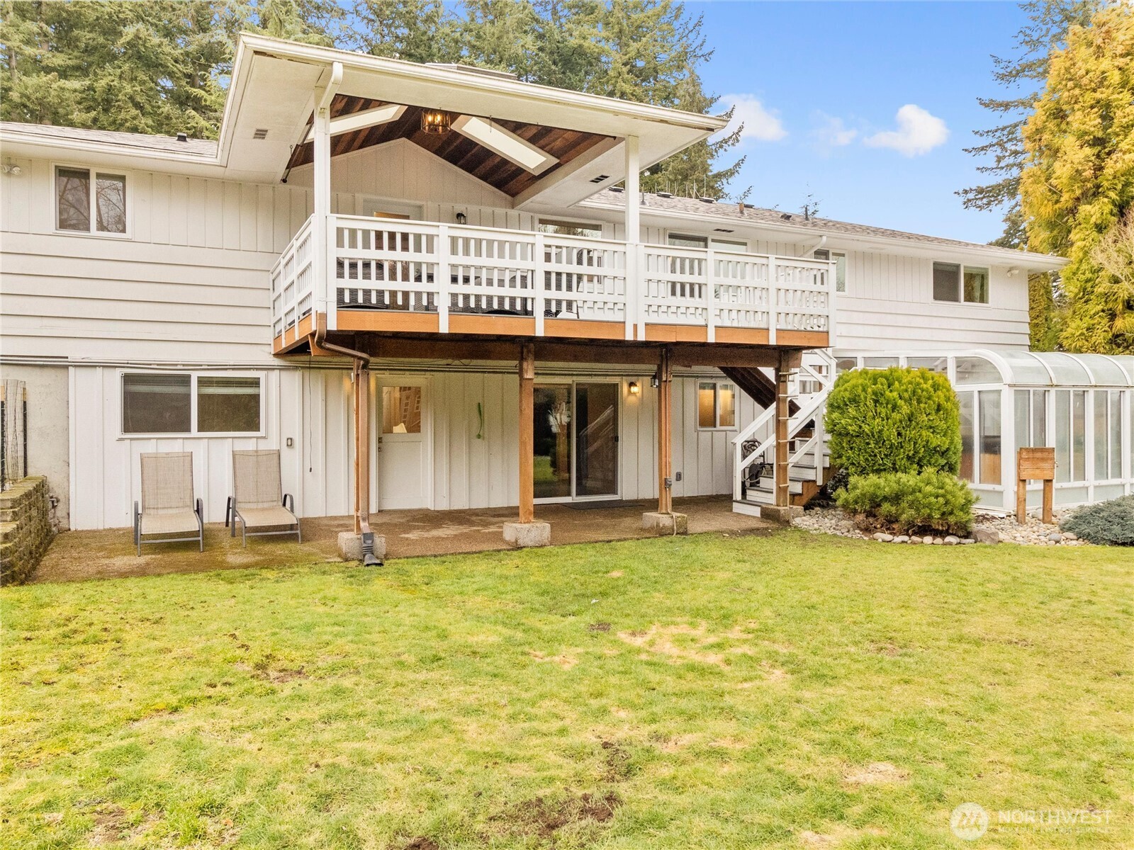 Covered patio space off the main and basement levels. Sliding door access to both.