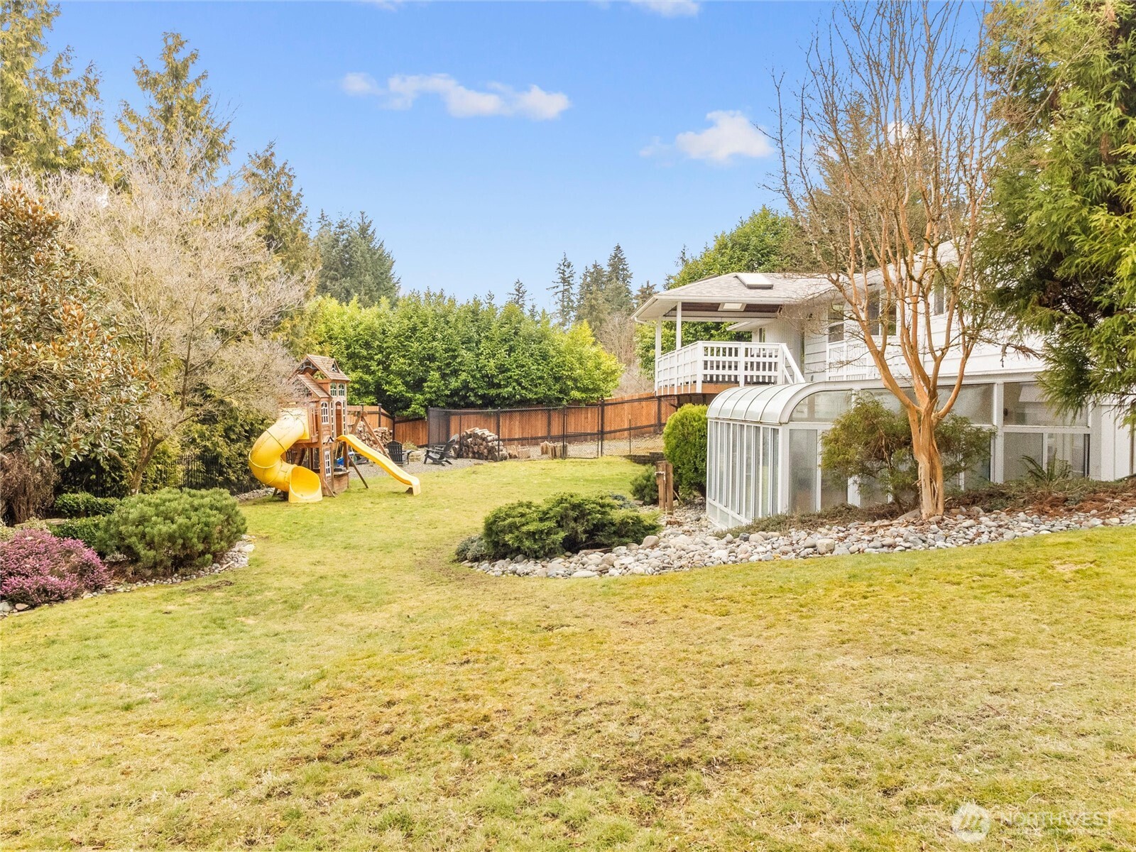 Ample backyard space! Well manicured yard & landscaping!