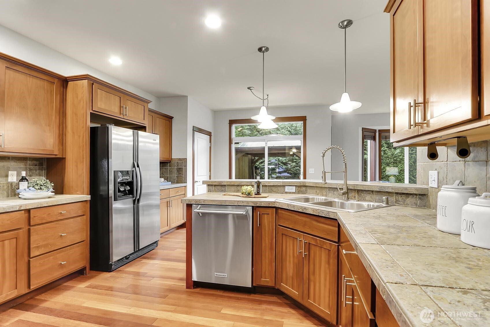 Bright and inviting kitchen with excellent lighting.