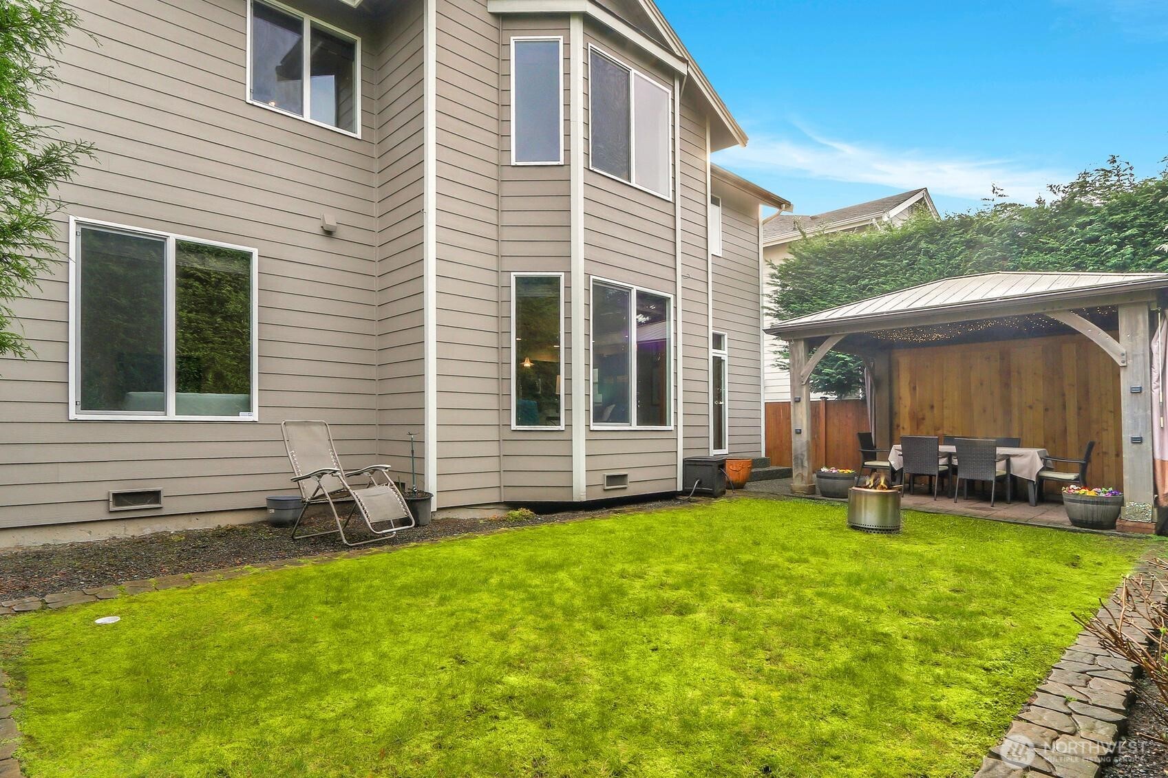 Private backyard and a covered gazebo—ideal for relaxing or entertaining.