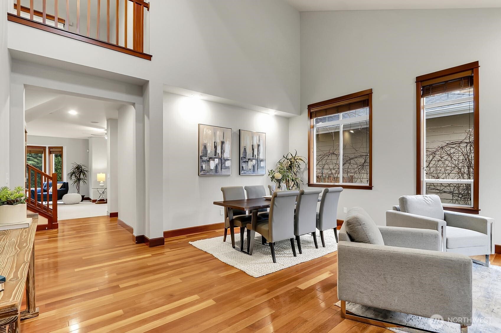 Beautiful hardwood floors flow through the living and dining areas.