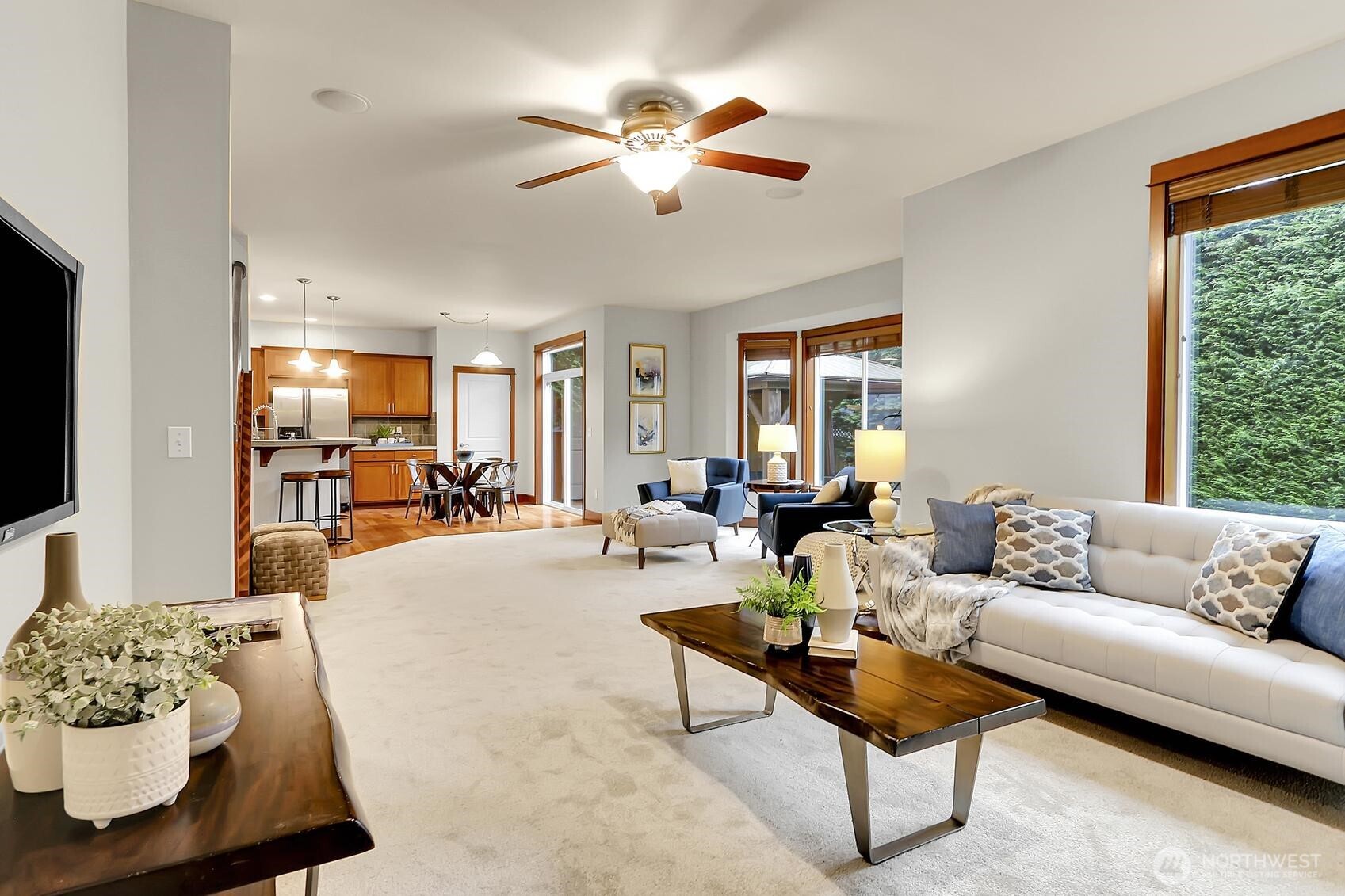 Spacious family room flows seamlessly into the dining area and kitchen—perfect for entertaining!