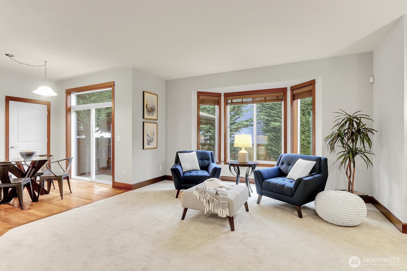 Sitting area with bay windows off the family room.