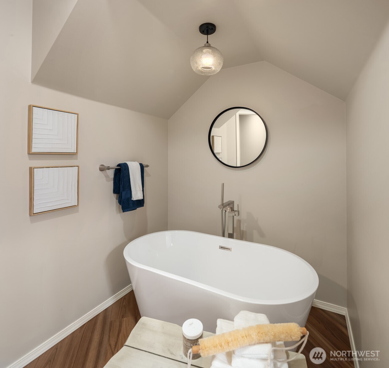 Relax in this elegant freestanding tub with tub filler and multi-color pendant with remote control