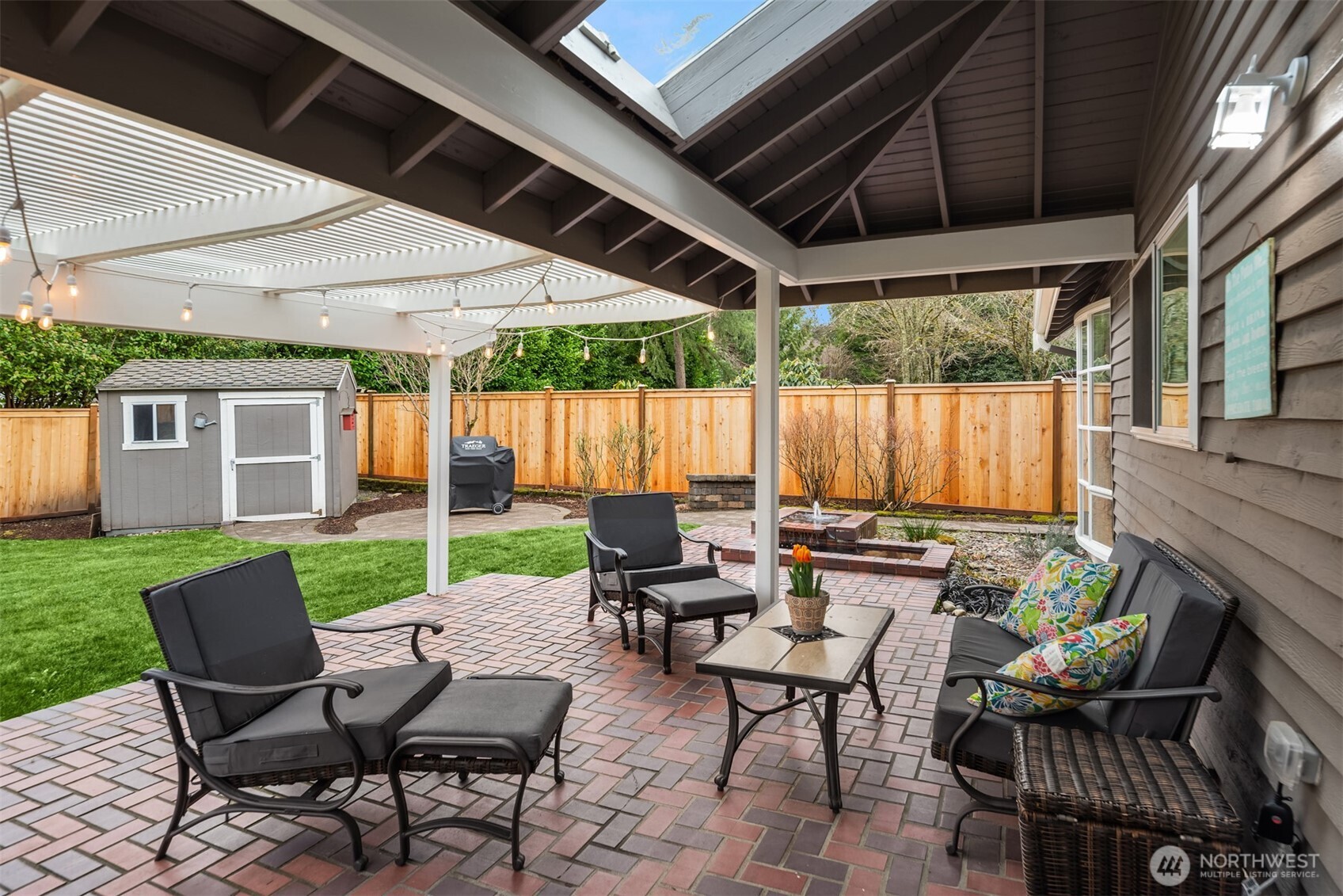 . Enjoy year-round gatherings on the covered brick patio.