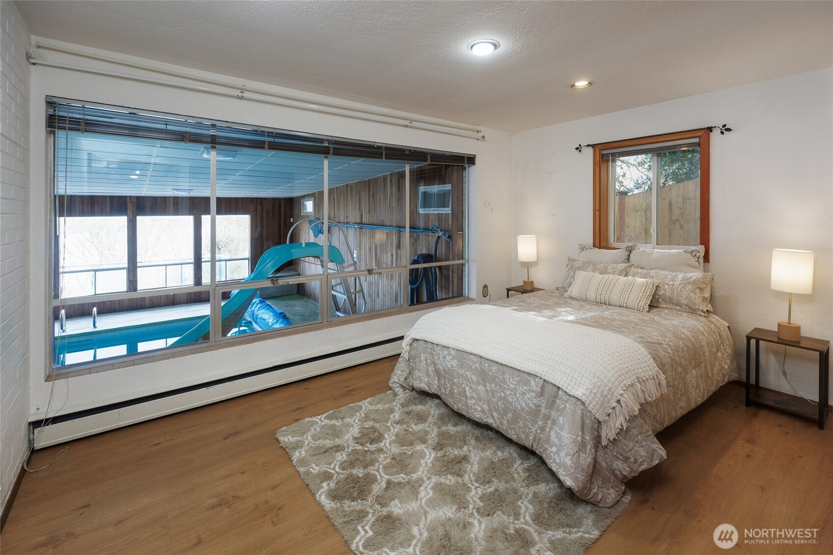 Lower level bedroom with pool view!