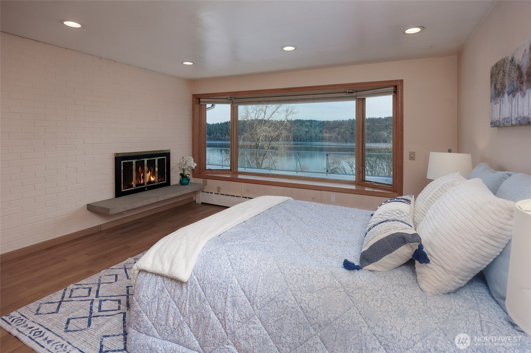 Wake up & enjoy the view in this main floor Primary suite.