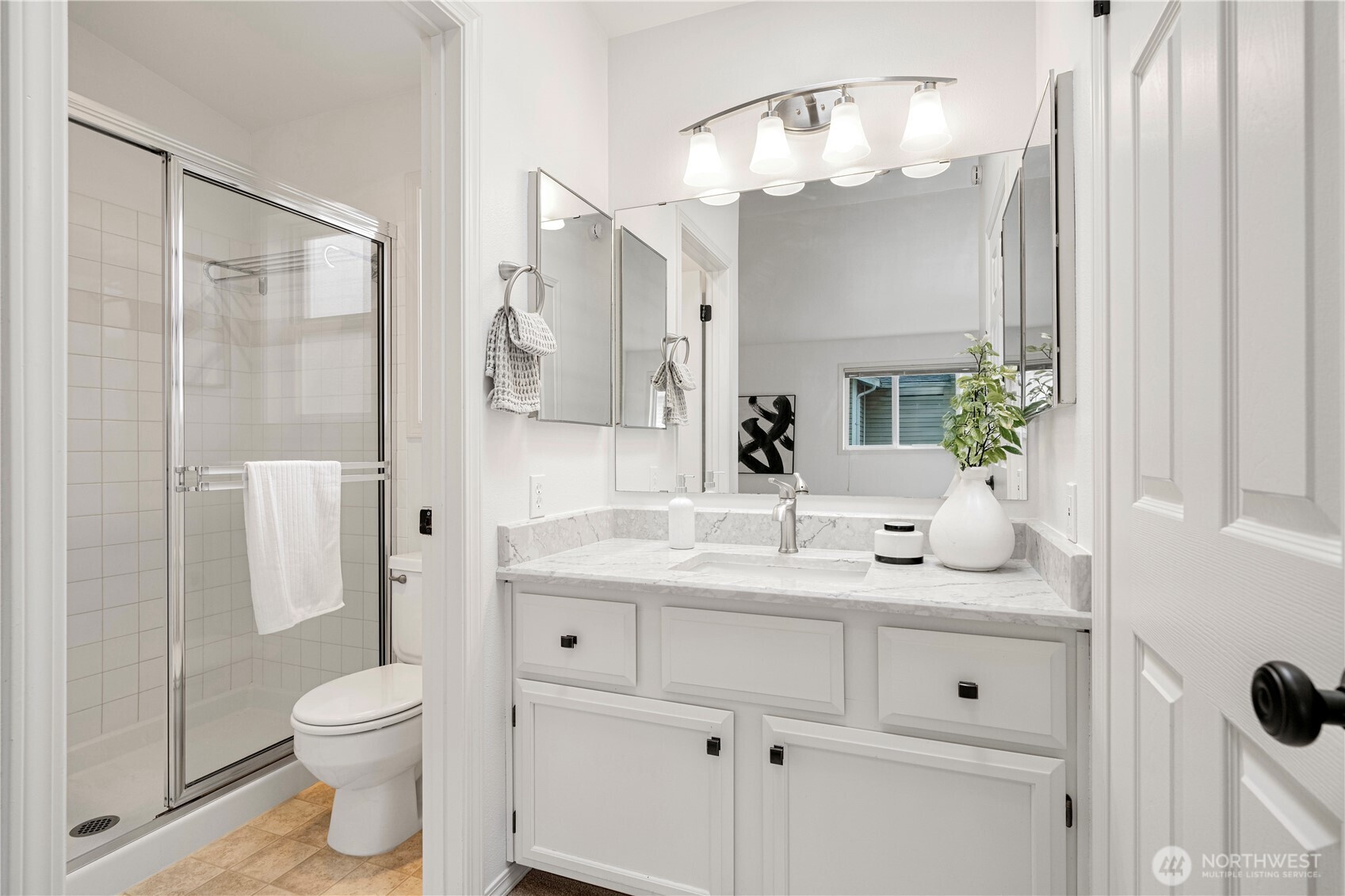 En-suite master bedroom with vaulted ceiling