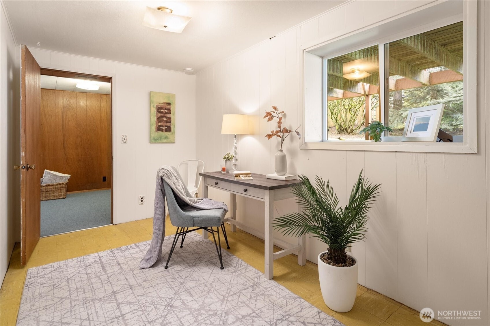 4th bedroom with closet and extra storage under stairs