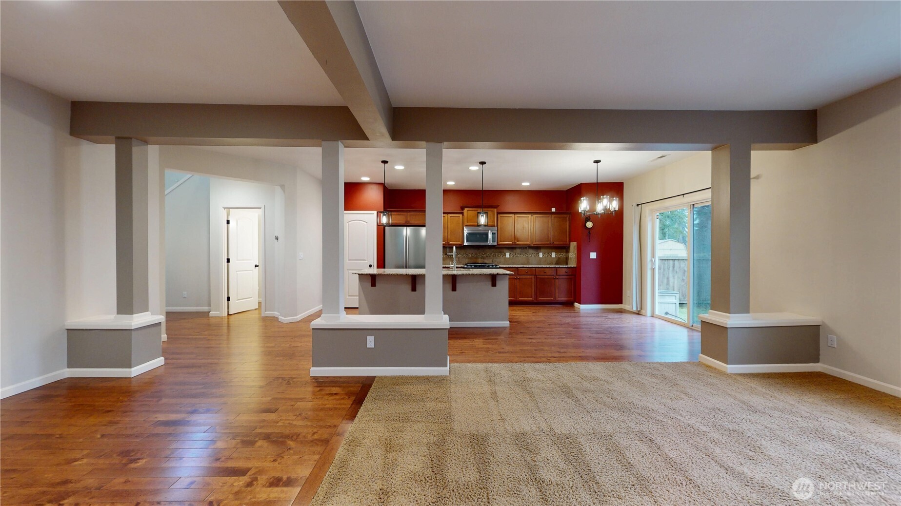 living room adjacent to kitchen and formal dinning