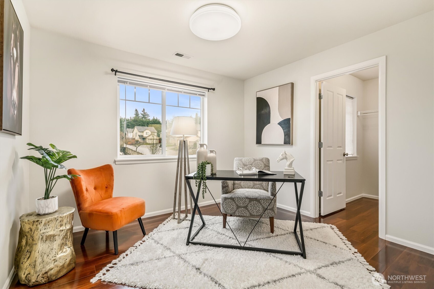 This fourth bedroom has been setup as a home office space.