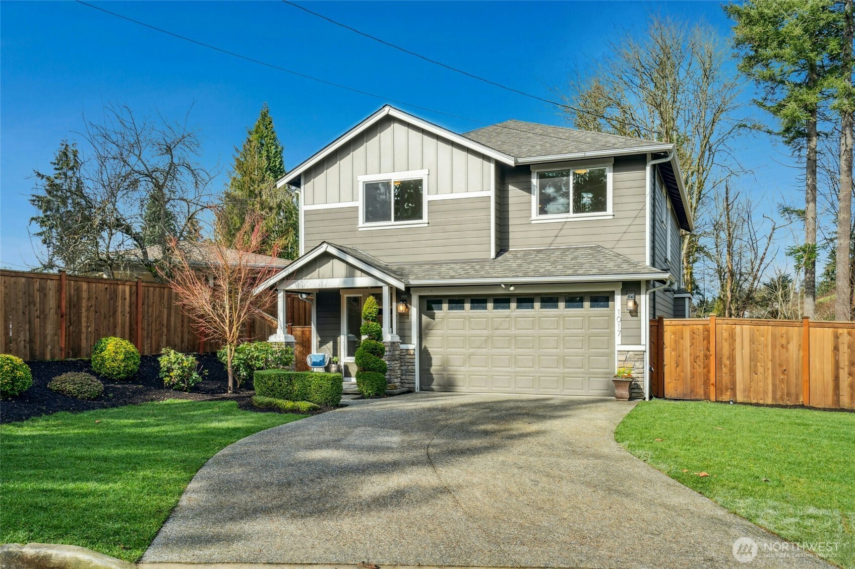 Well-paved driveway offers ample parking and a smooth entrance to home