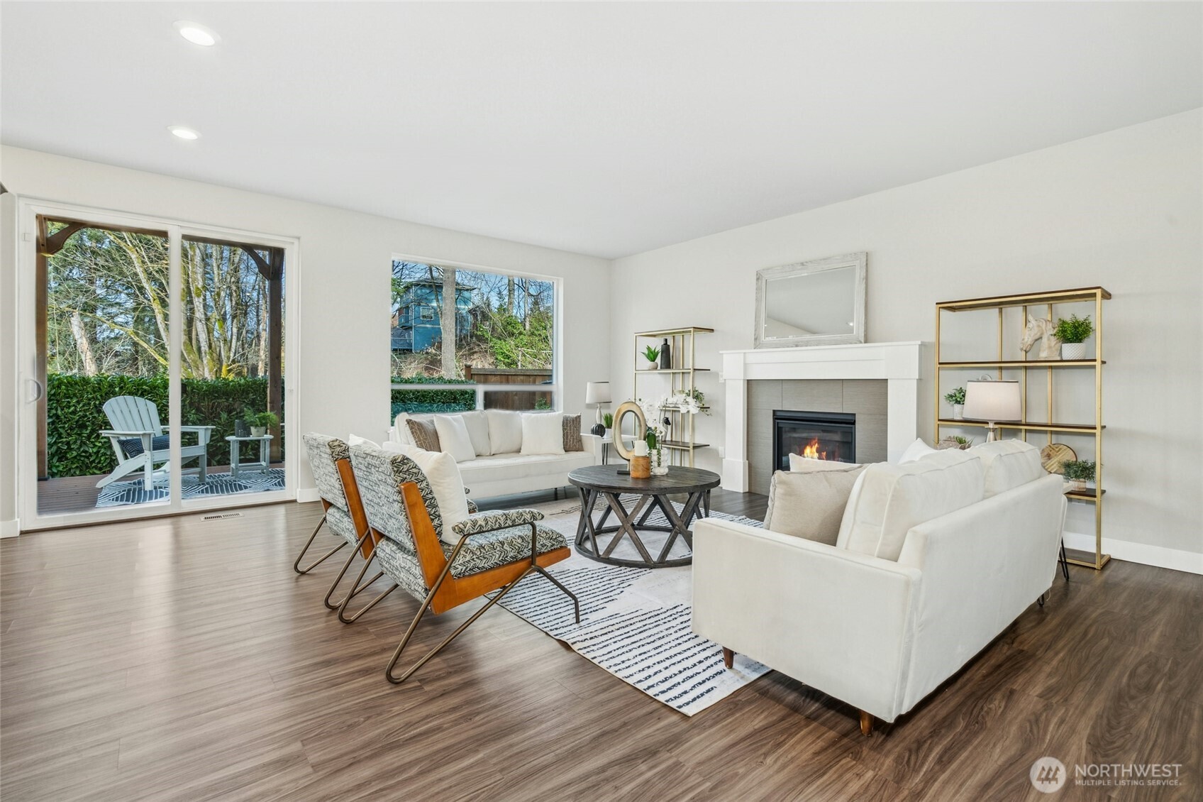 Generously spacious living room with a gas fireplace