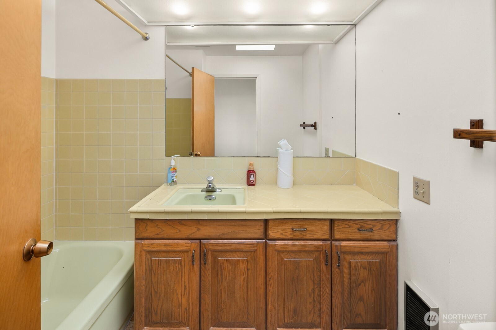 Keep the mid-century vintage flair of this bathroom or....