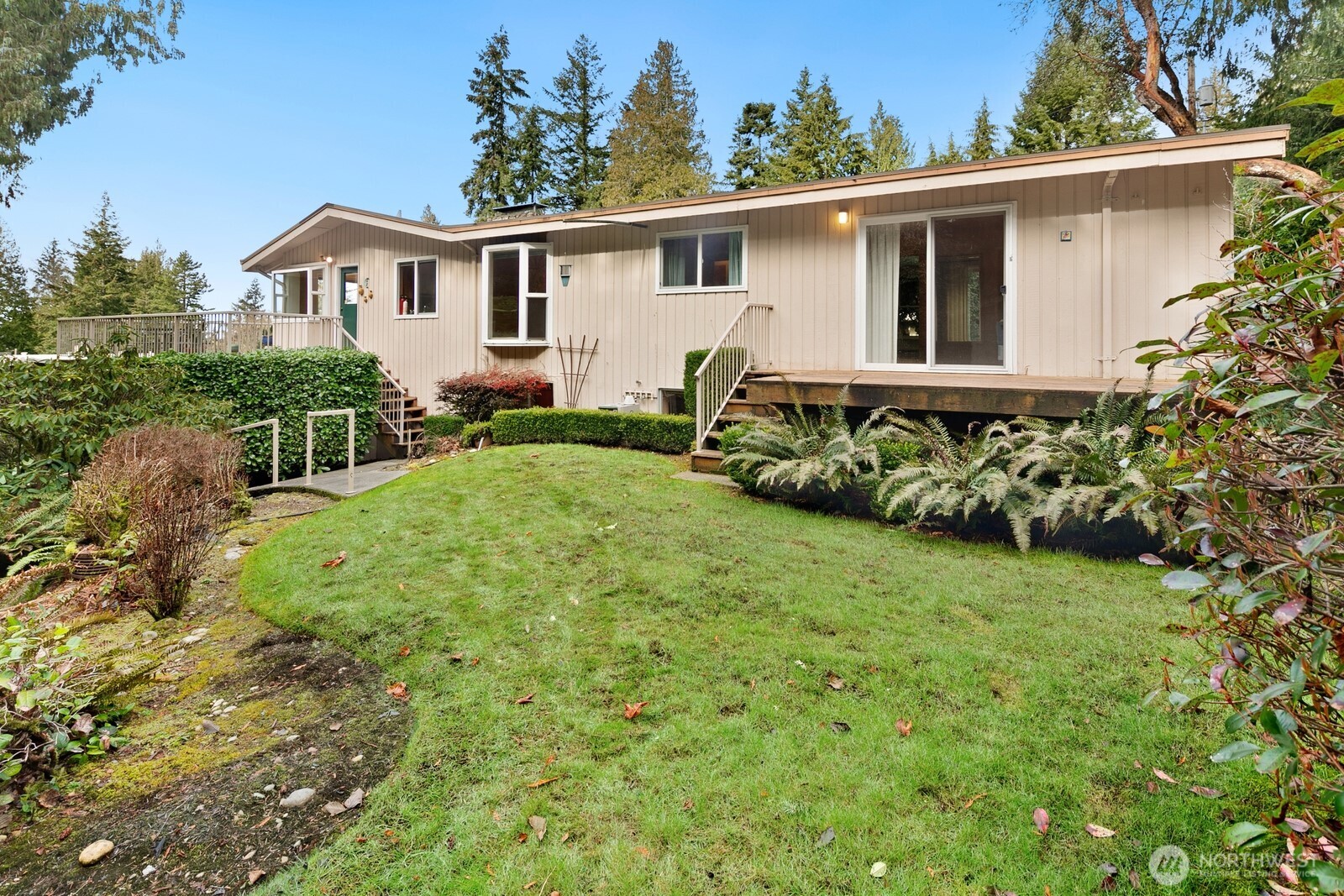 This home is set on a large ~.63-acre lot in coveted Edmonds.