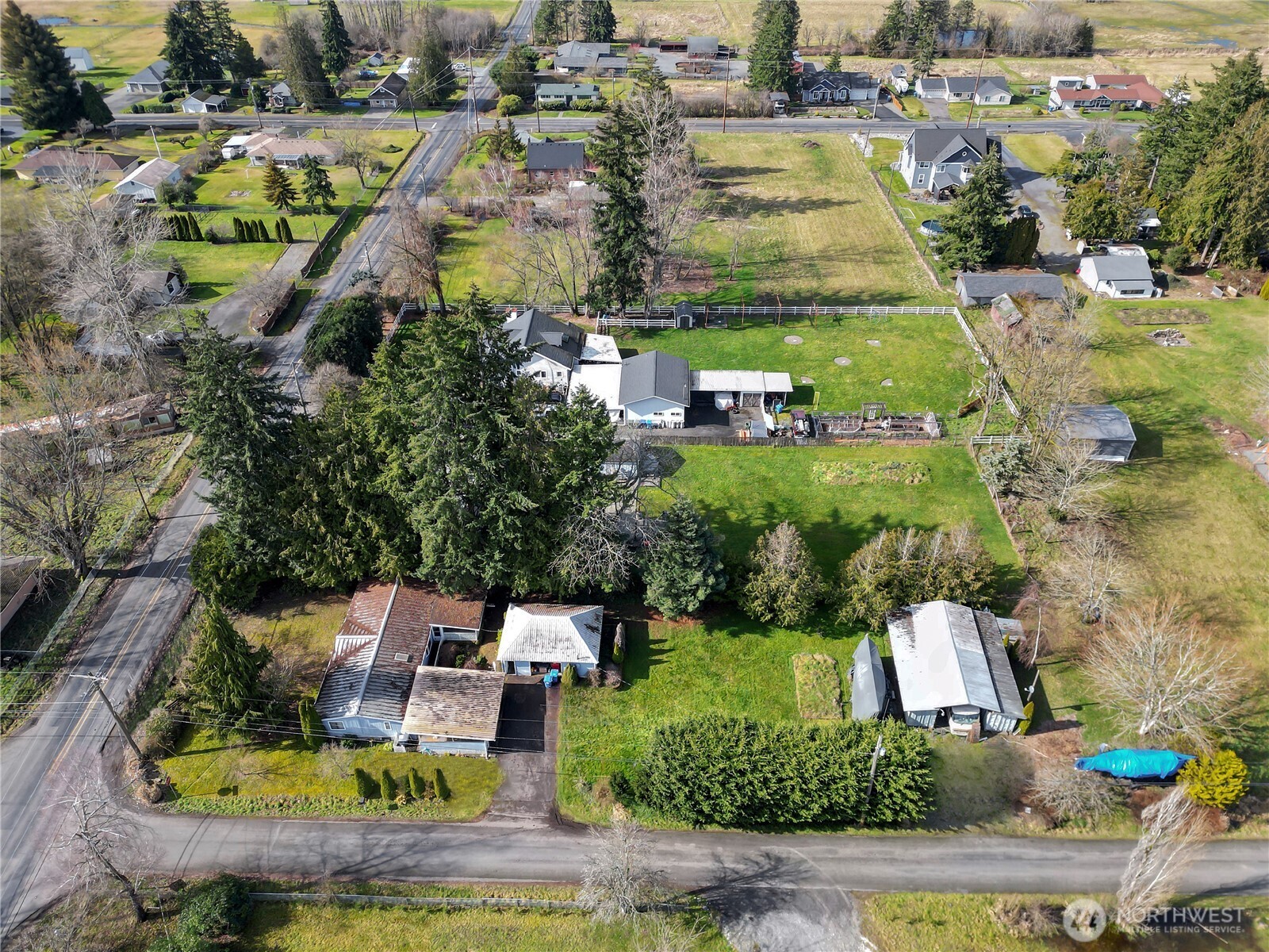 Facing west showing 96th St E and driveway off 40th Ave E