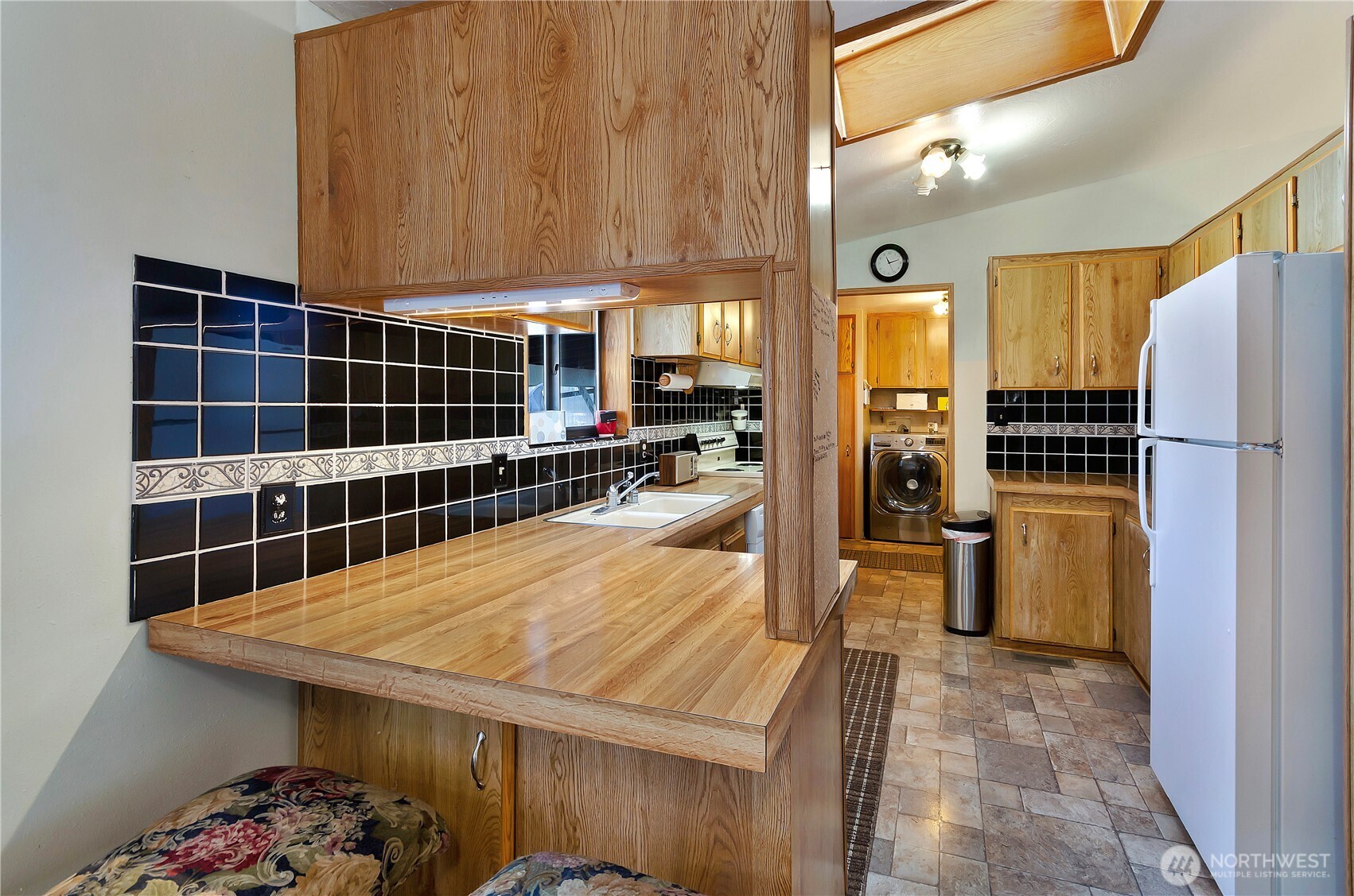 Kitchen toward utility and back door