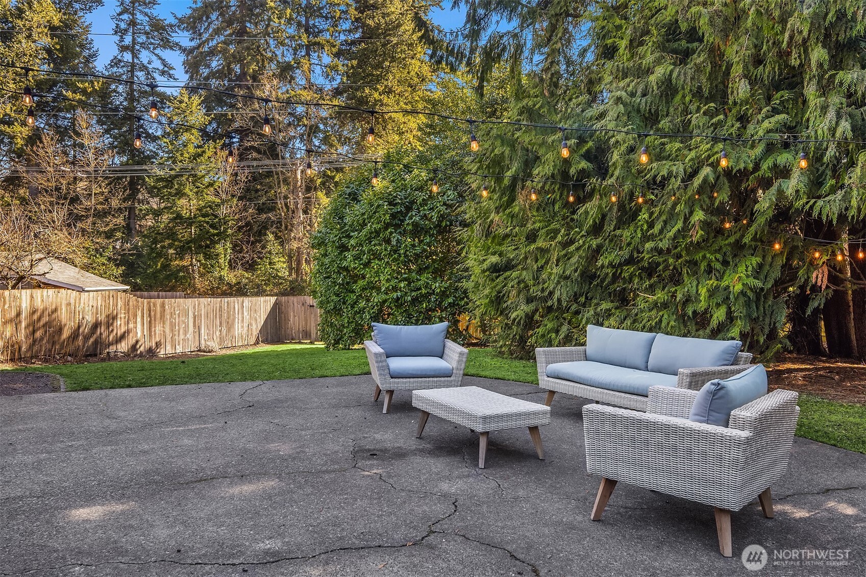 Spacious outdoor area with patio.