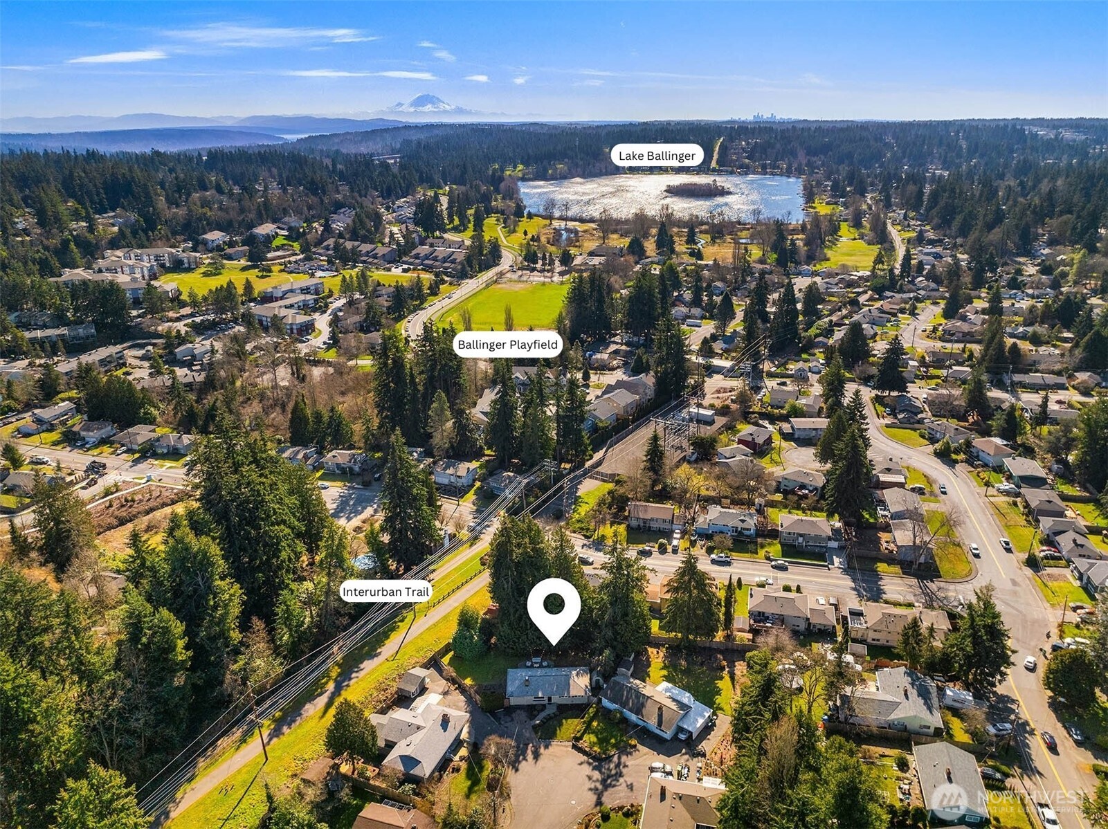 Drone photo of the home showing access to the Interurban Trail, Ballinger Playfield and Lake Ballinger.