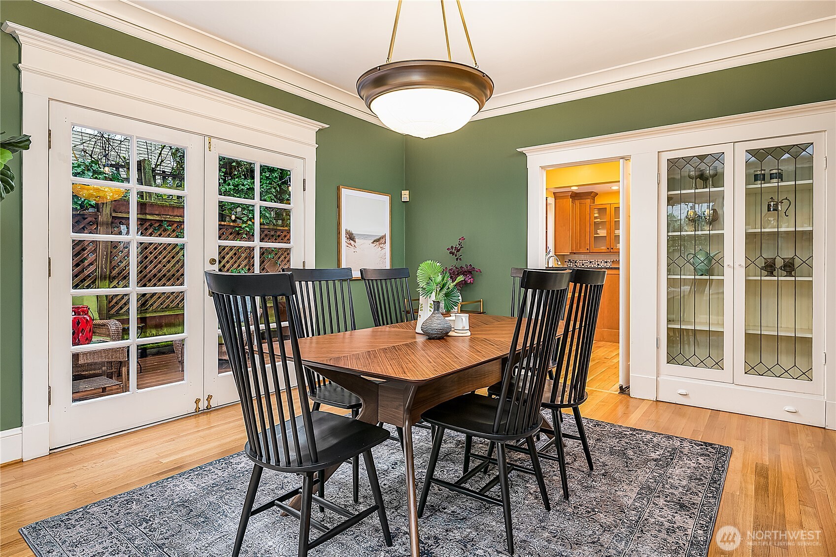 Charming built-ins with leaded glass doors.