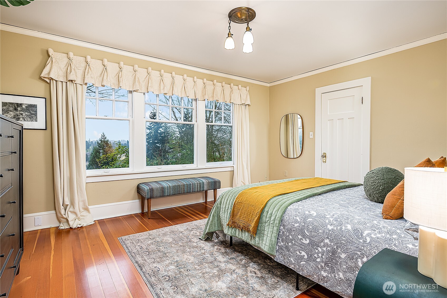 The spacious primary bedroom features a walk-in closet.