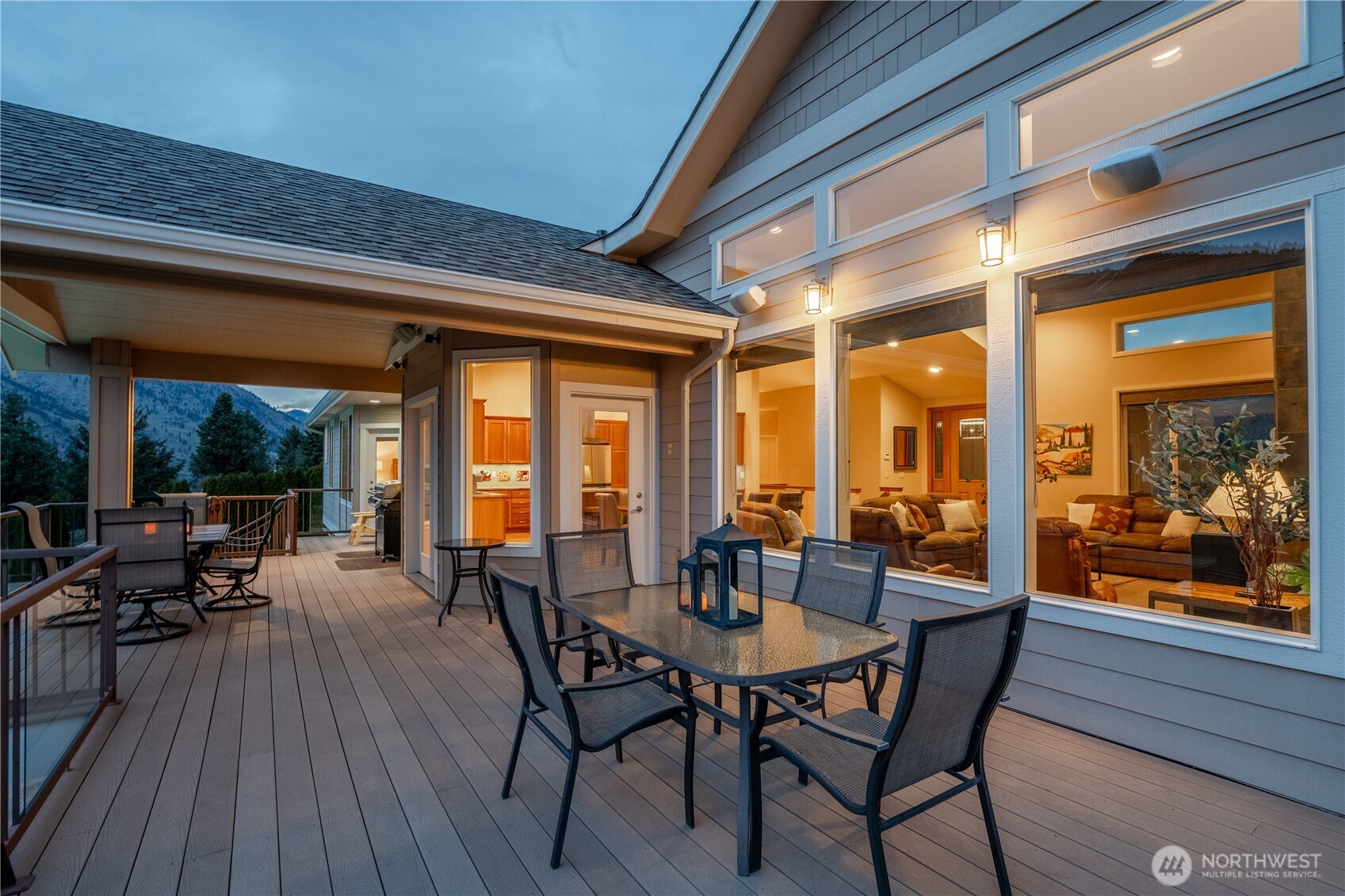 Exterior twilight view of main level upper Trex